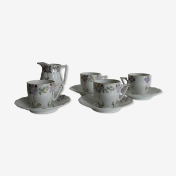 Set of 4 cups and porcelain milk pot