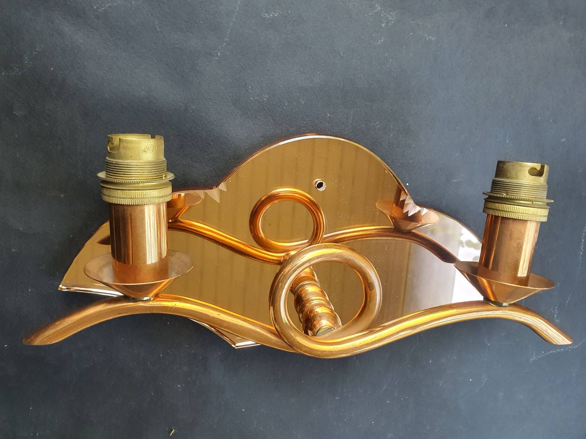 Copper wall lamp with 1940s Art Deco shades.