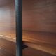 wall-mounted bookcase in wood and black metal, Scandinavian design 1970