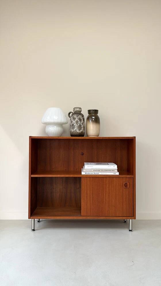 Vintage wooden cabinet with sliding doors
