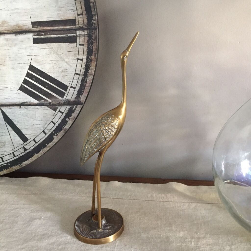 Couple of brass herons