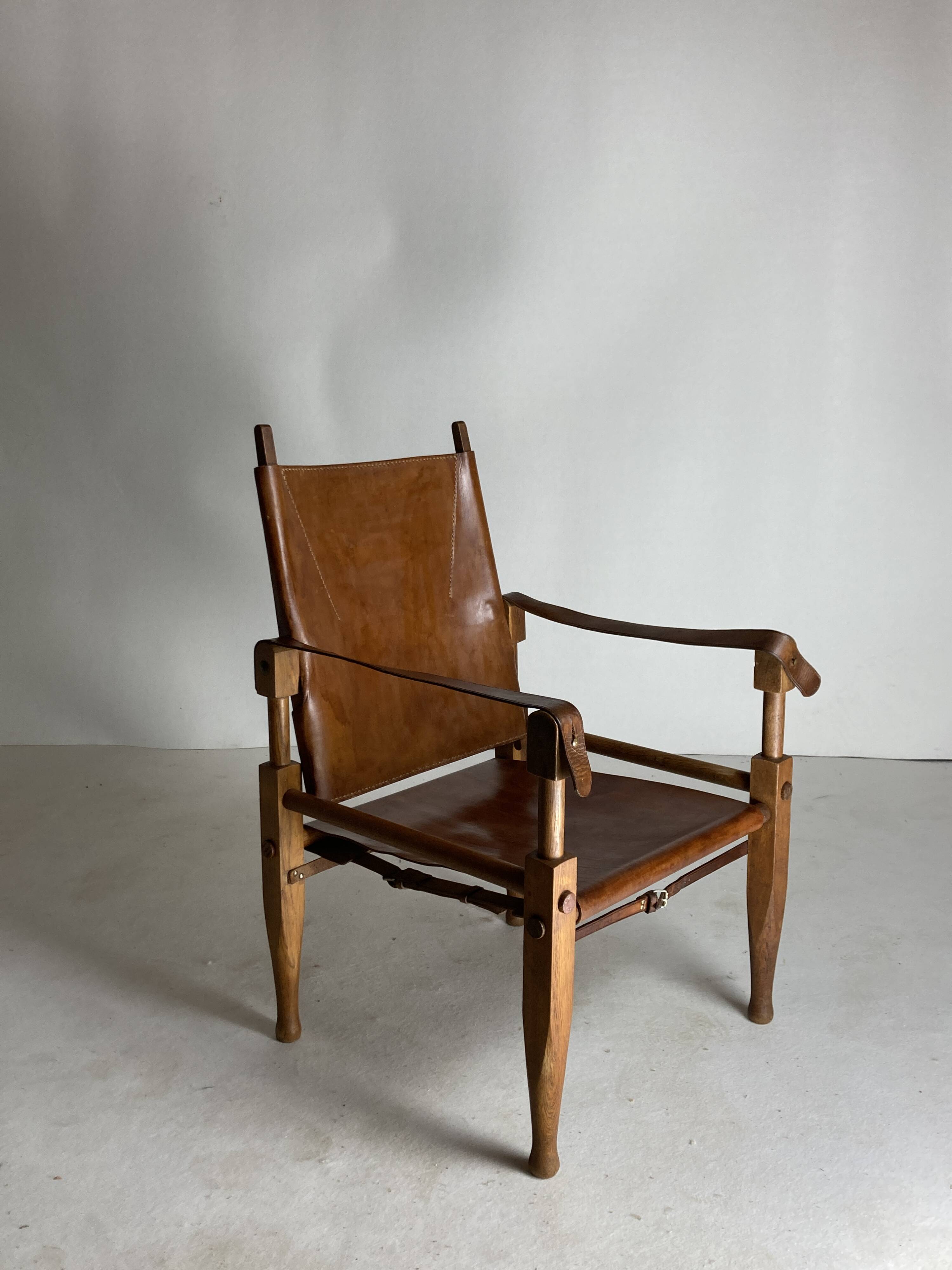 Leather safari armchair by Wilhelm Kienzle for Wohnbedarf, 1950s