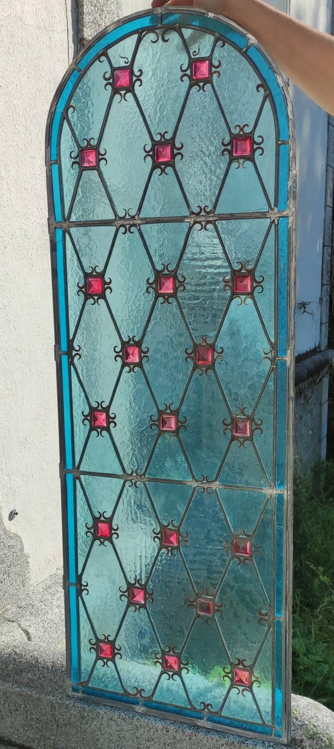 Old stained glass window in the Middle Ages style