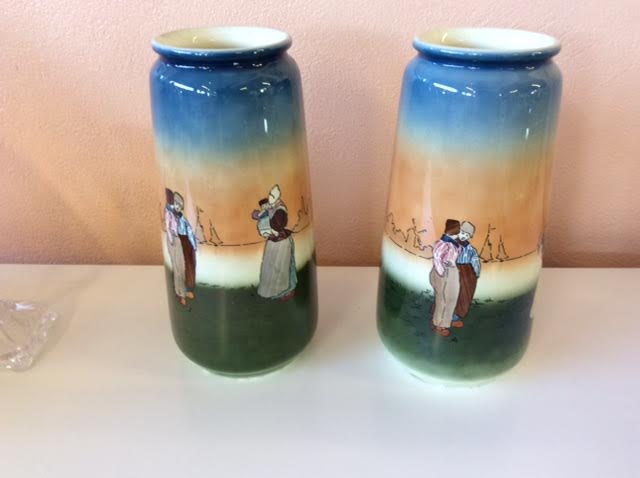 Pair of enamelled sandstone vases