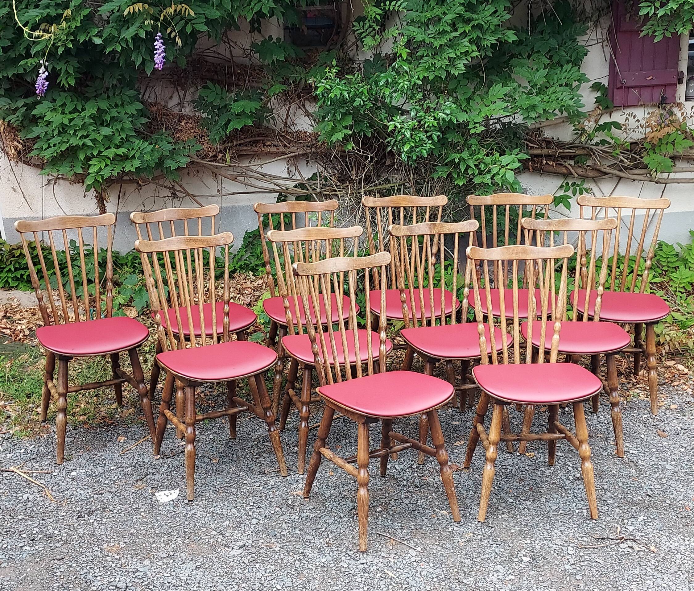 Serie de 12 chaises bistrot baumann à barreaux