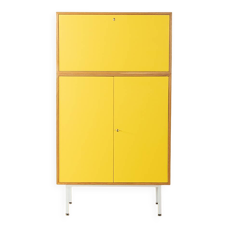 Classic sideboard from the 1960s, oak veneer, yellow Resopal, white steel feet