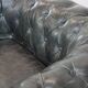 Set of 2 black Chesterfield armchairs in grained cowhide leather