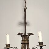 Empire-style bronze chandelier with 3 arms of light topped with eagle heads. French work. Circa 1900.