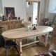 Table ovale avec rallonge intégrée