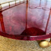 Cherry-red bar cart by Aldo Tura, Italy, 1960s, Hollywood Regency
