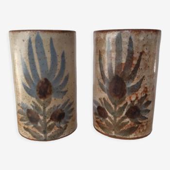 Two vases rolls decorated with thistles, signed