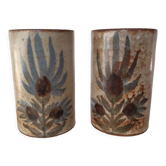 Deux vases rouleaux à décor de chardons signés