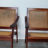 Pair of armchairs in red teak and cannage