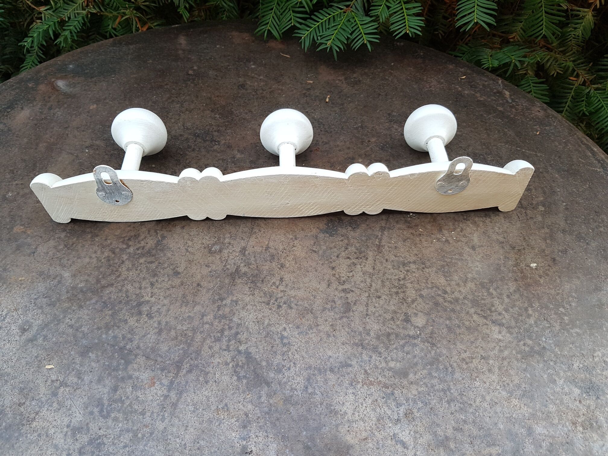 White wooden wall coat rack
