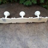 White wooden wall coat rack