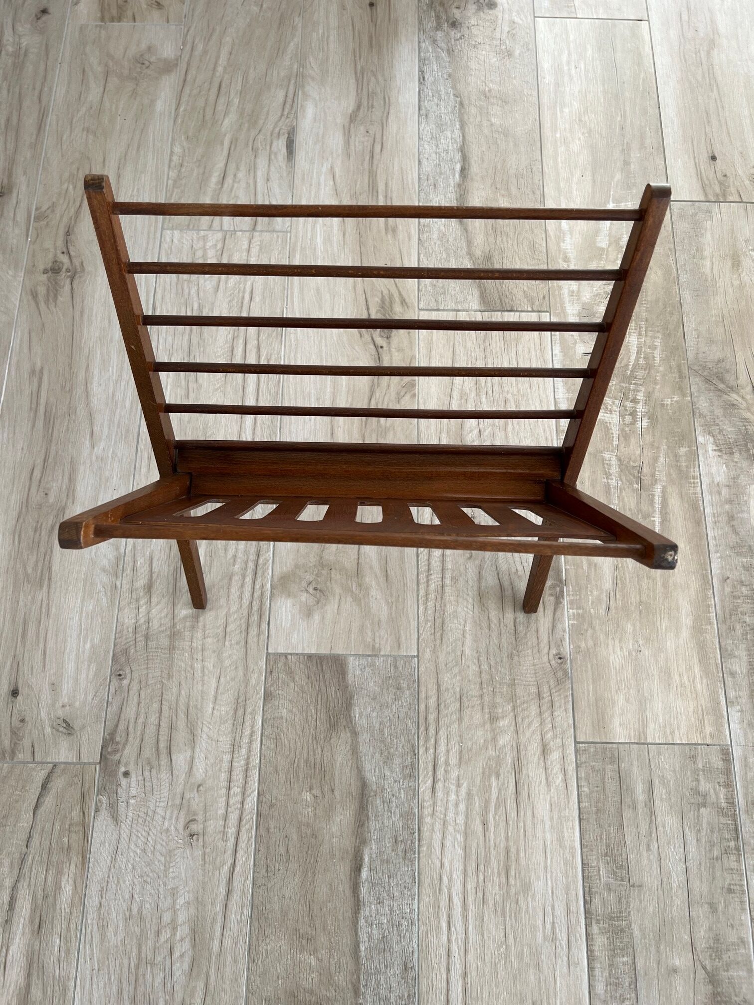 Folding magazine door