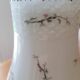Vase en porcelaine décor polychrome "aux vieux chinois"