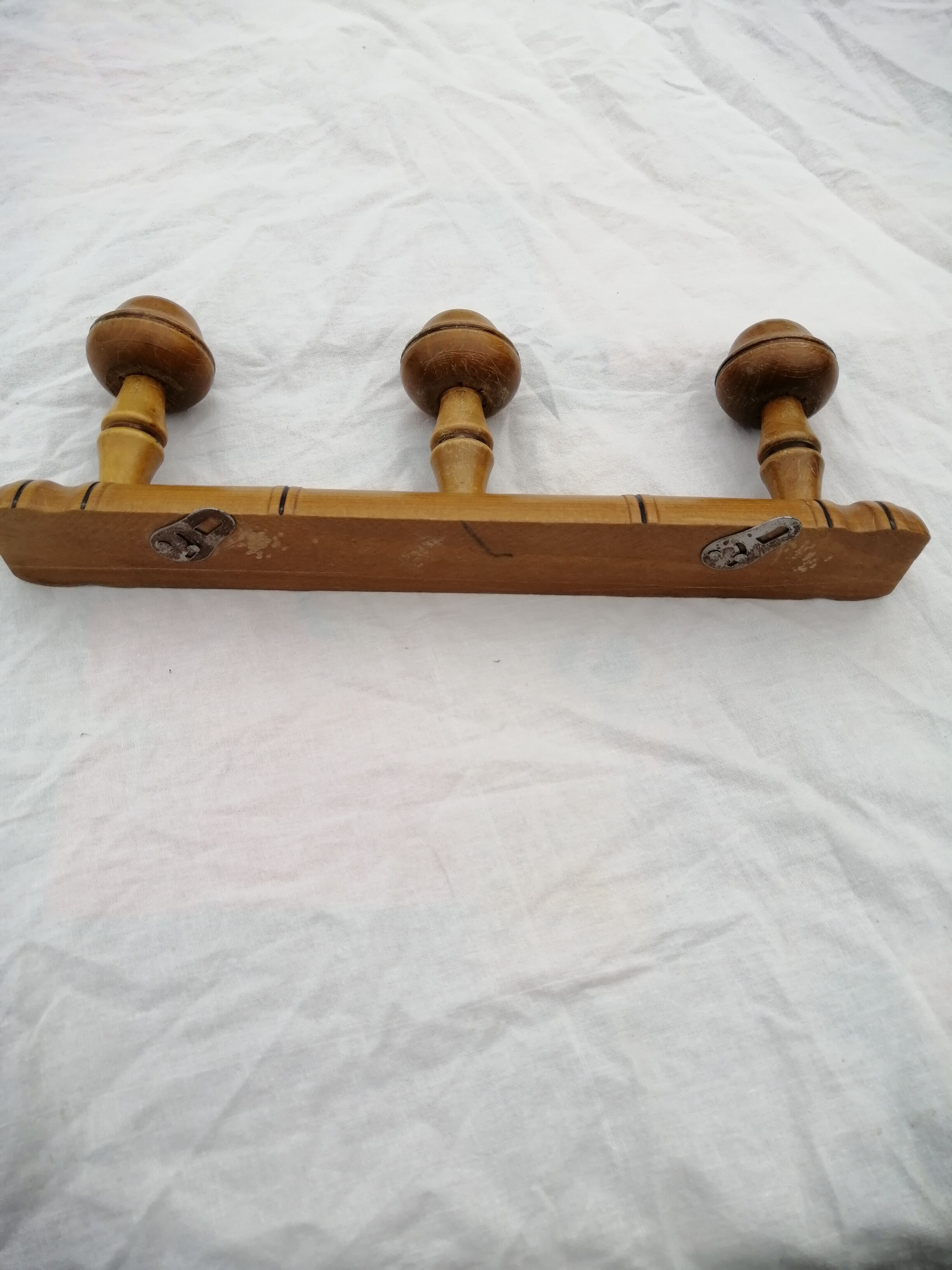 Wooden wall coat rack