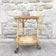 Round dessert bar in rattan and vinyl braided straw way