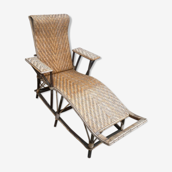 Old wood rattan chaise longue