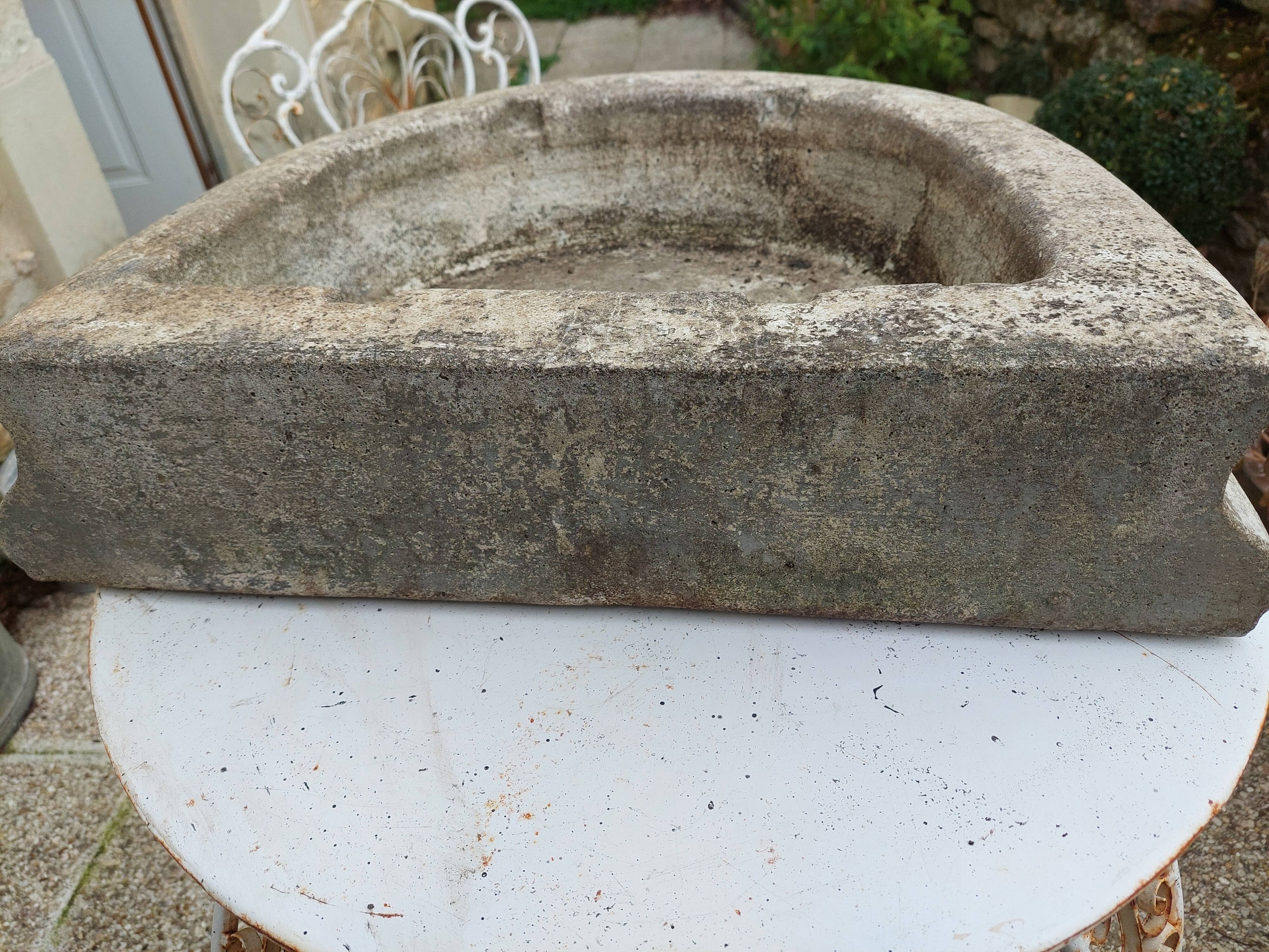 Reconstituted stone sink from the early 20th century.