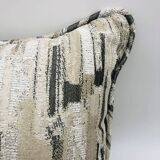 Coussin carré à bords passepoilés