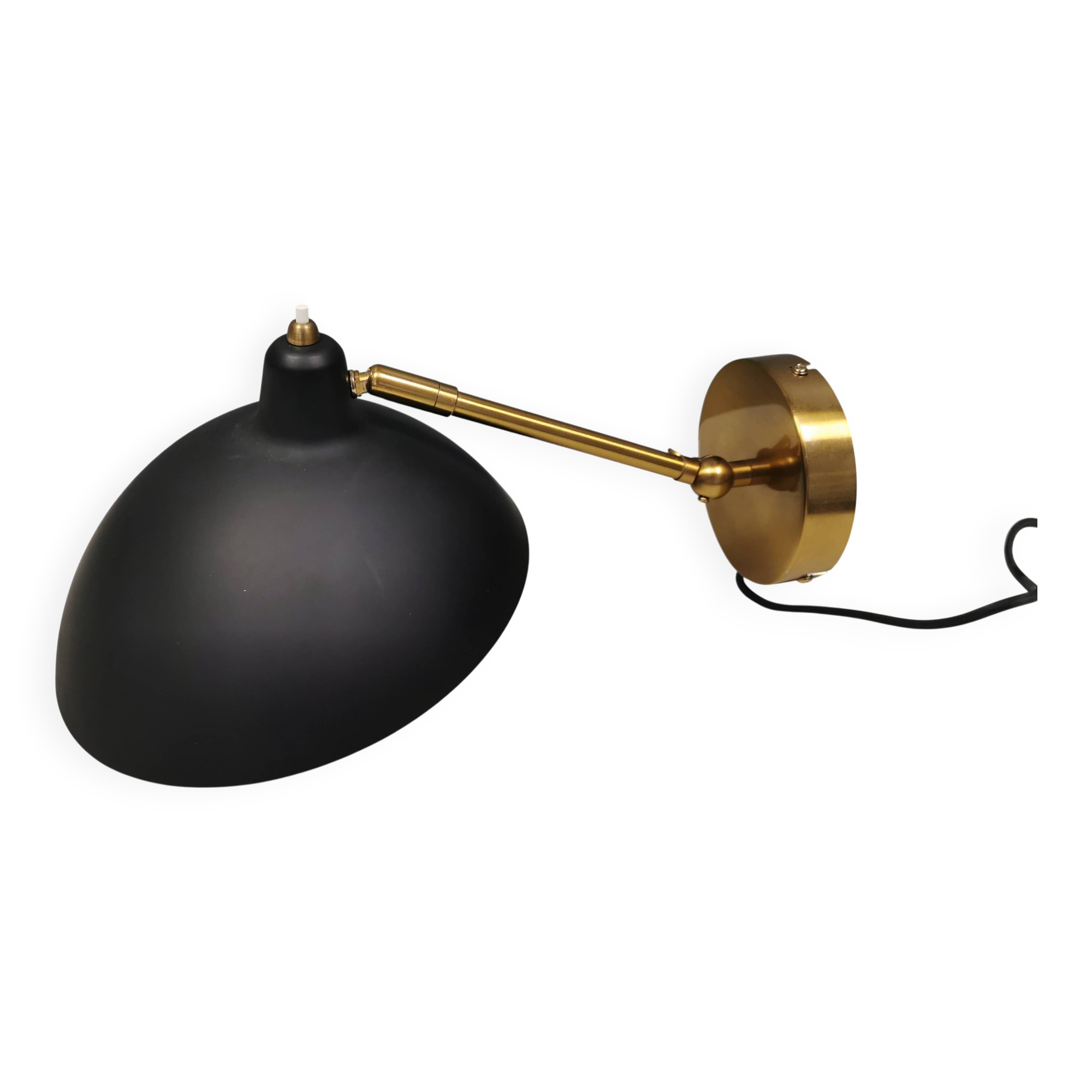 A wall lamp in black and brass-coloured finishes. Danish, early 2000s.