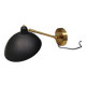 A wall lamp in black and brass-coloured finishes. Danish, early 2000s.