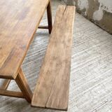 Oak farmhouse table and its two benches