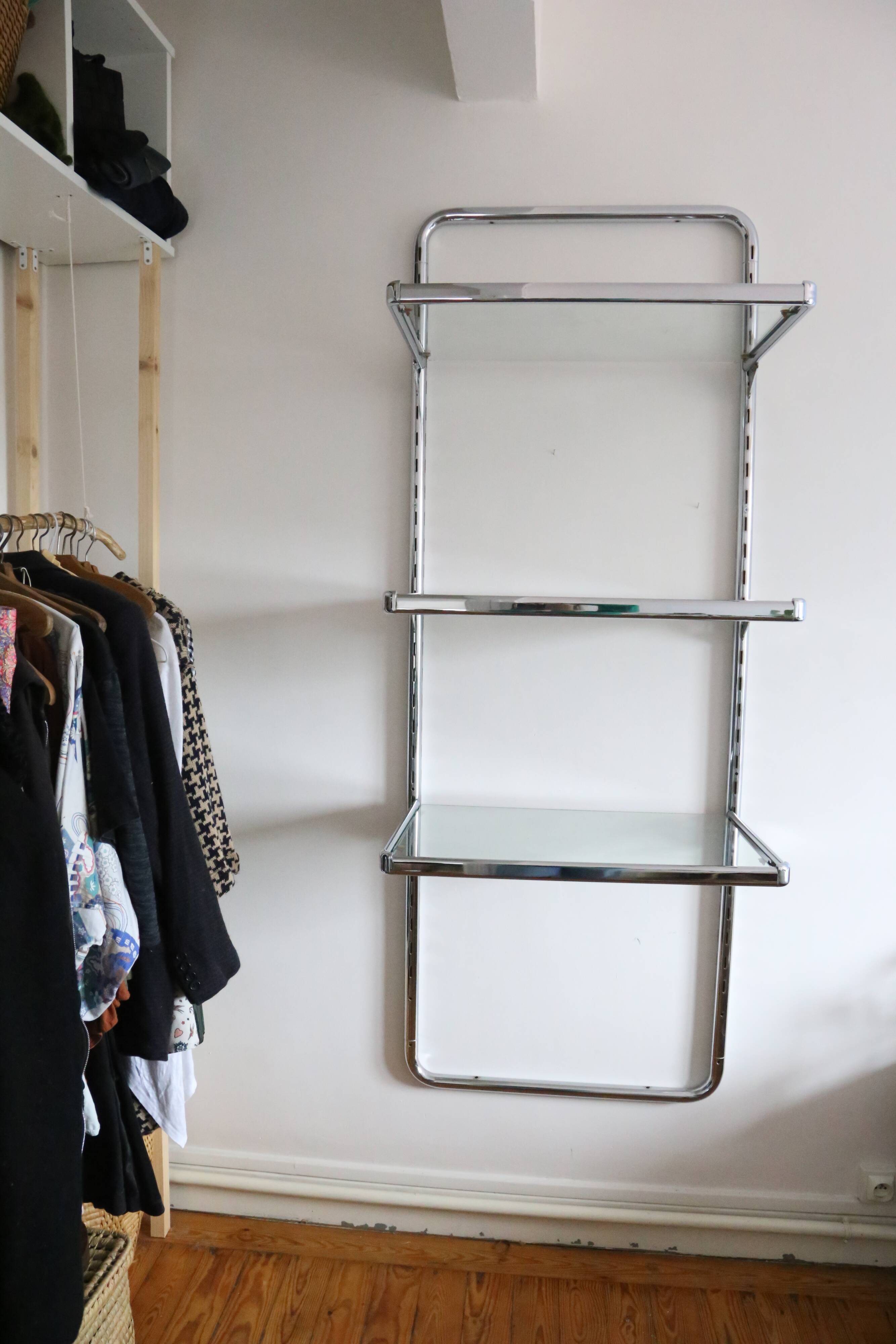 Chrome and glass wall shelf, circa 1960