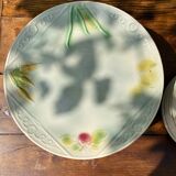 Service 10 plates and 14 sub-plates St Clement