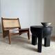 Black mango wood tripod side table with a semi-spherical top, height: 45 cm, diameter: 44 cm.