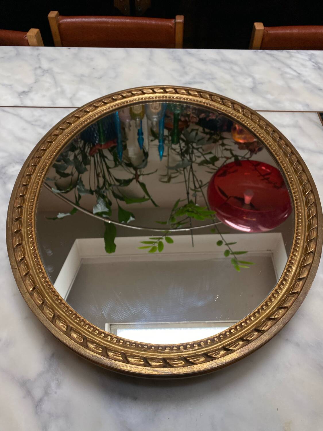 Large oval mirror in wood gilded with fine gold