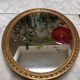 Large oval mirror in wood gilded with fine gold
