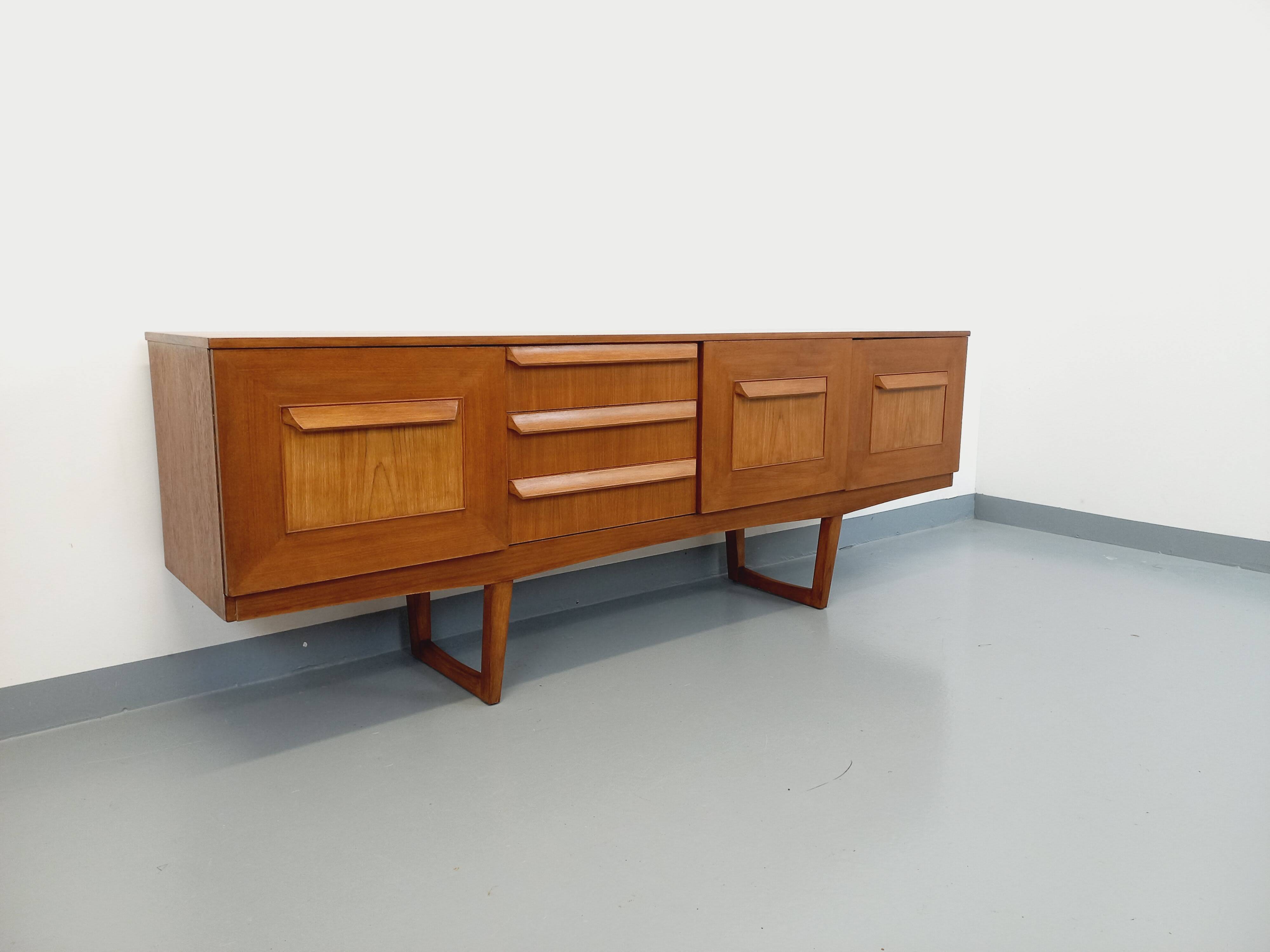 Vintage Scandinavian style sled foot sideboard in teak from the 60s