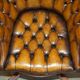 Fauteuil Chesterfield directeur ou capitaine Art Déco en cuir restauré