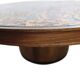 Vintage round wooden coffee table with a copper top.