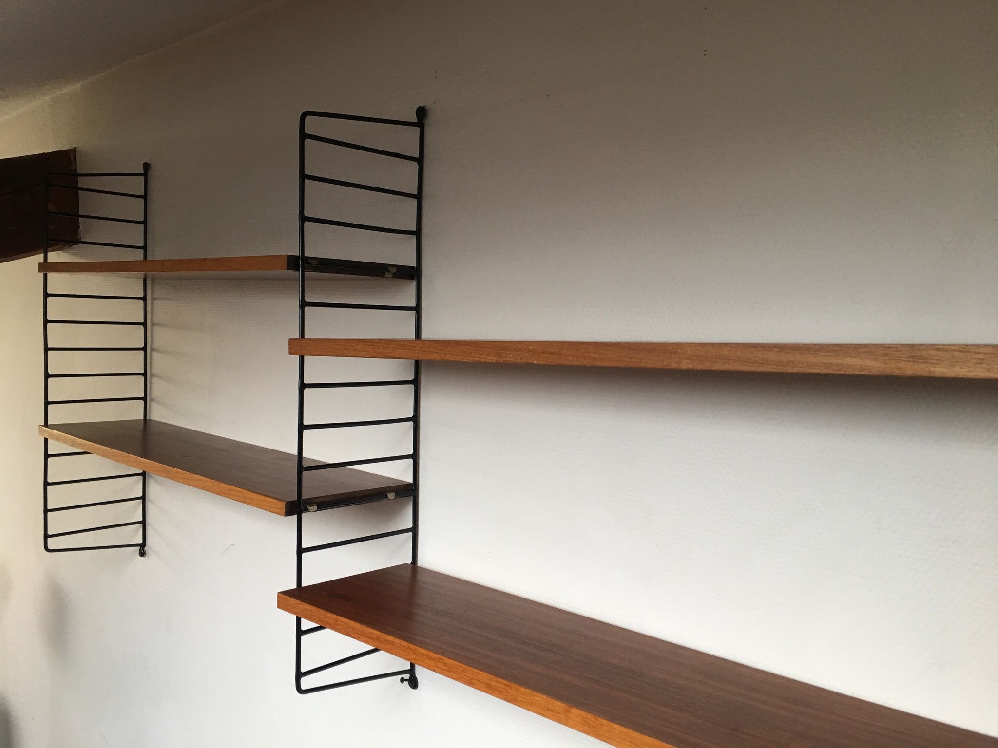 Shelf String icon of Scandinavian design designed by architect nils strinning and his wife kajsa