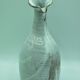 Pitcher at the leaning collar in snarl