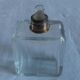 Lot of 4 glass toilet bottles, silver metal caps