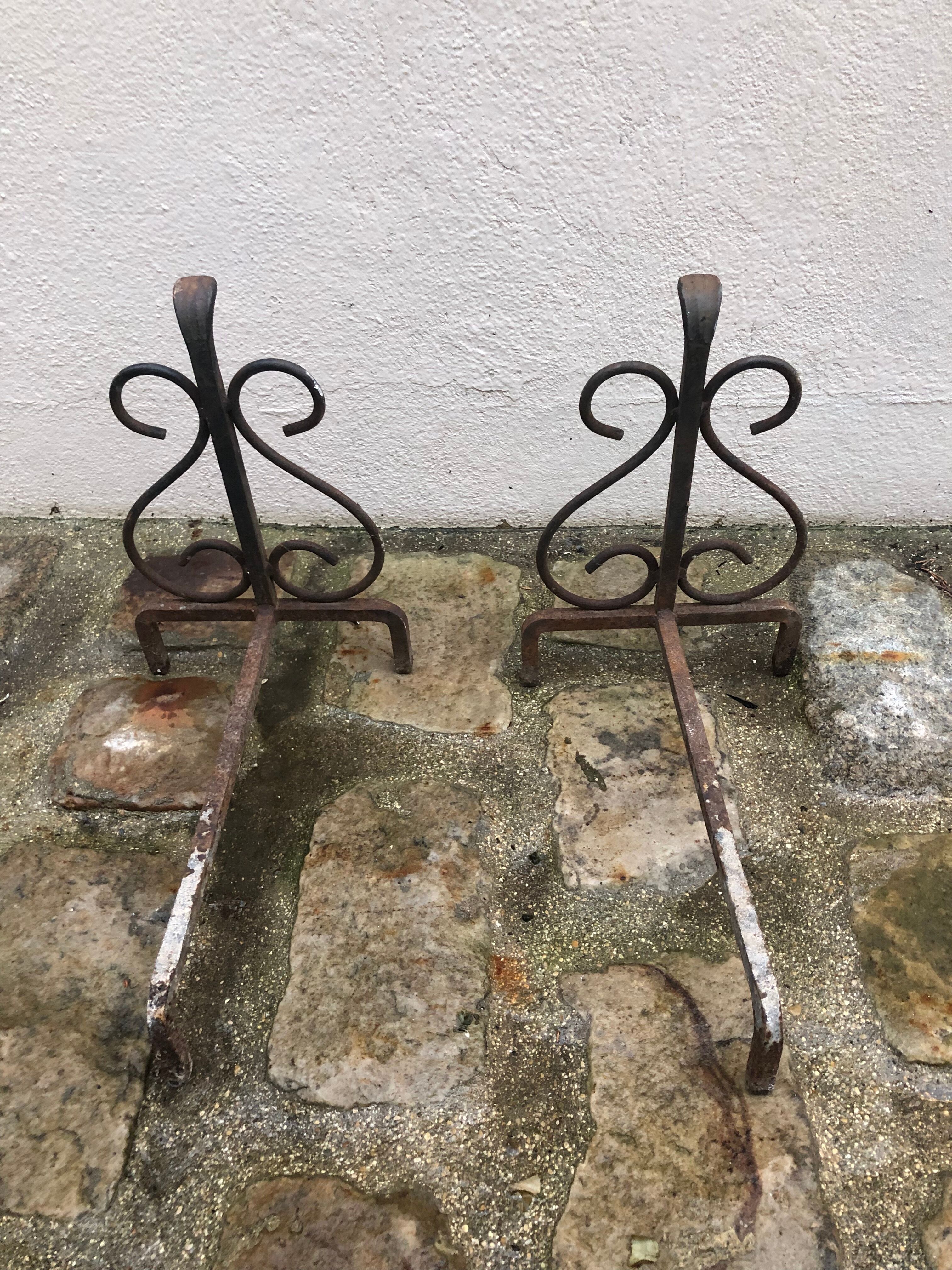 Pair of wrought iron pegs