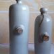 Lot 2 old hot water bottles in enamelled sandstone