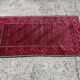 Vintage handmade Baluch rug with geometric pattern from the 1950s.