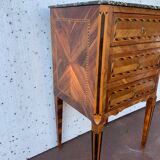 Small chest of drawers of Louis XVI style in veneer wood