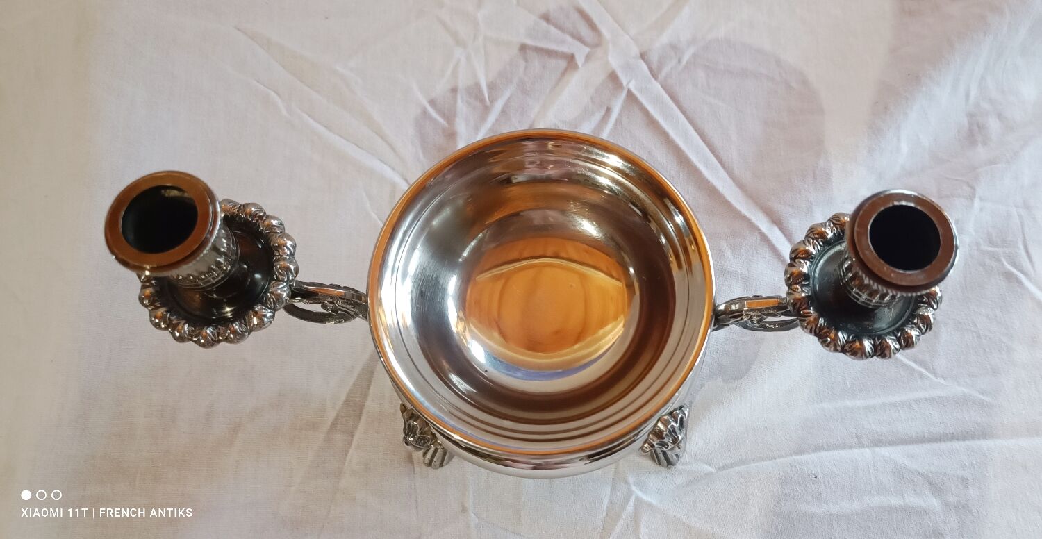 Silver-plated candlestick burns scented oil, Art Nouveau style, late 19th century.