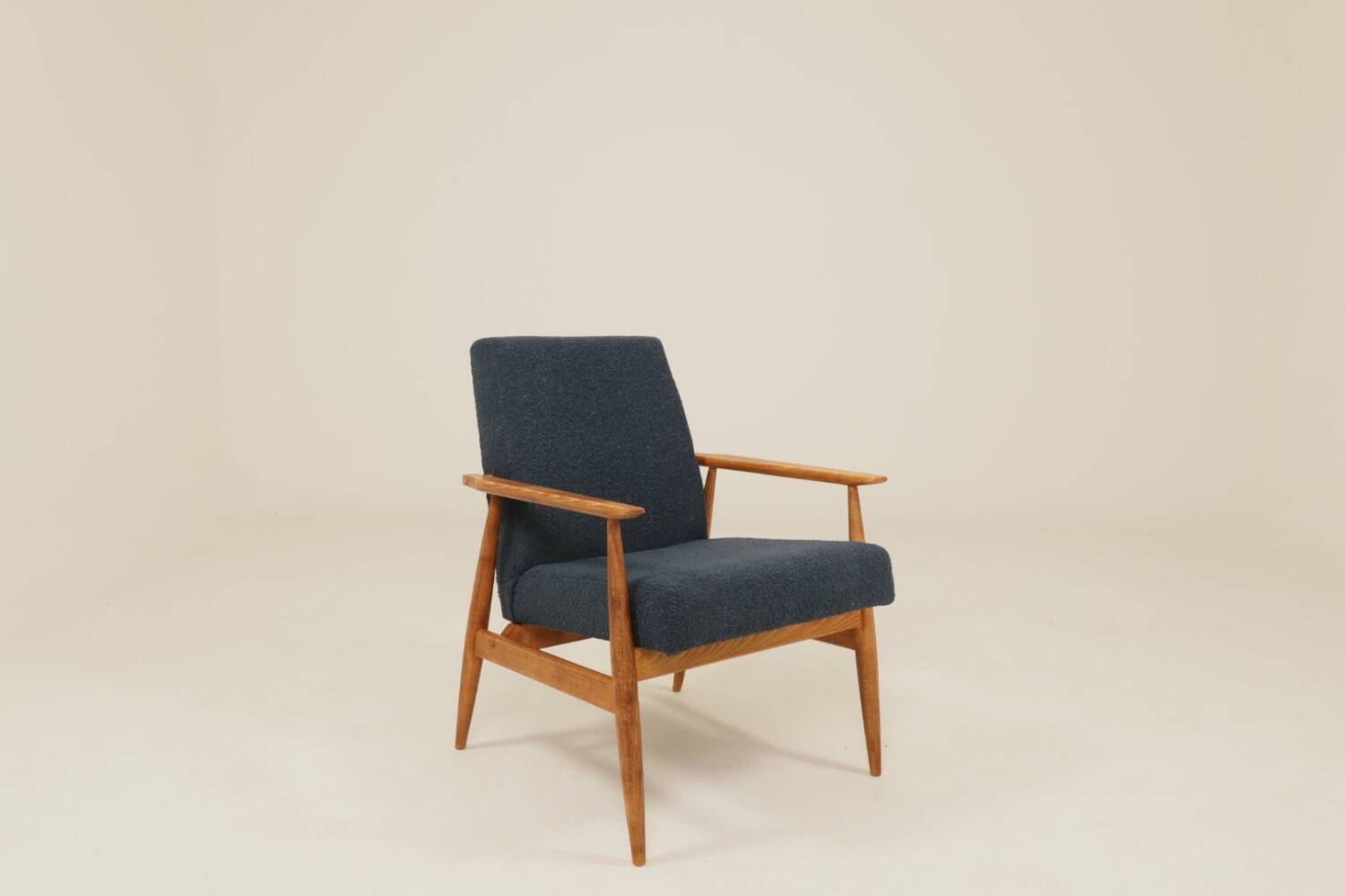 Scandinavian armchair in navy blue bouclé design by H. Lis