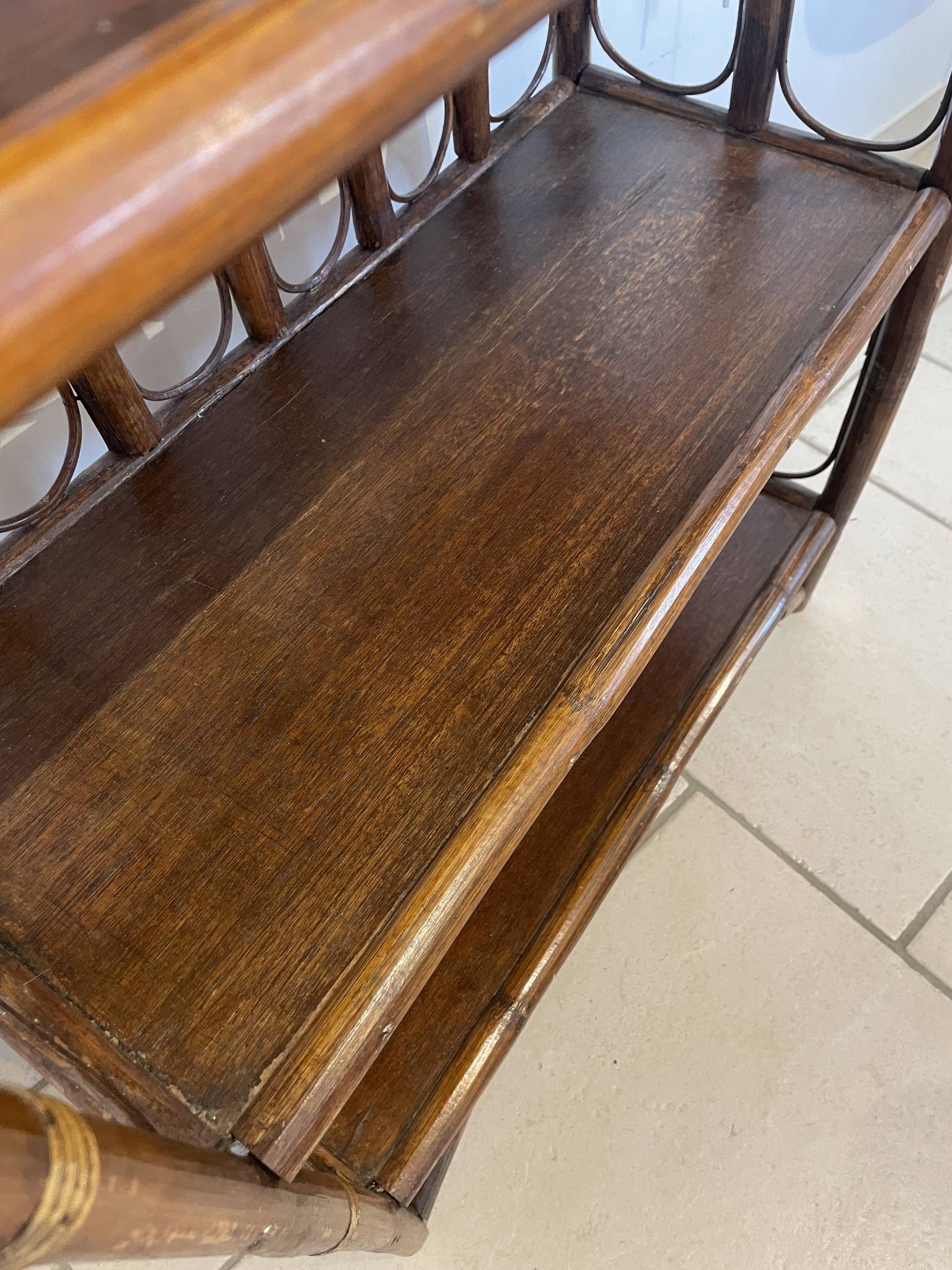 Shelf on rattan and bamboo legs from the 70s