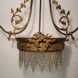 Gold metal chandelier and three-light beads