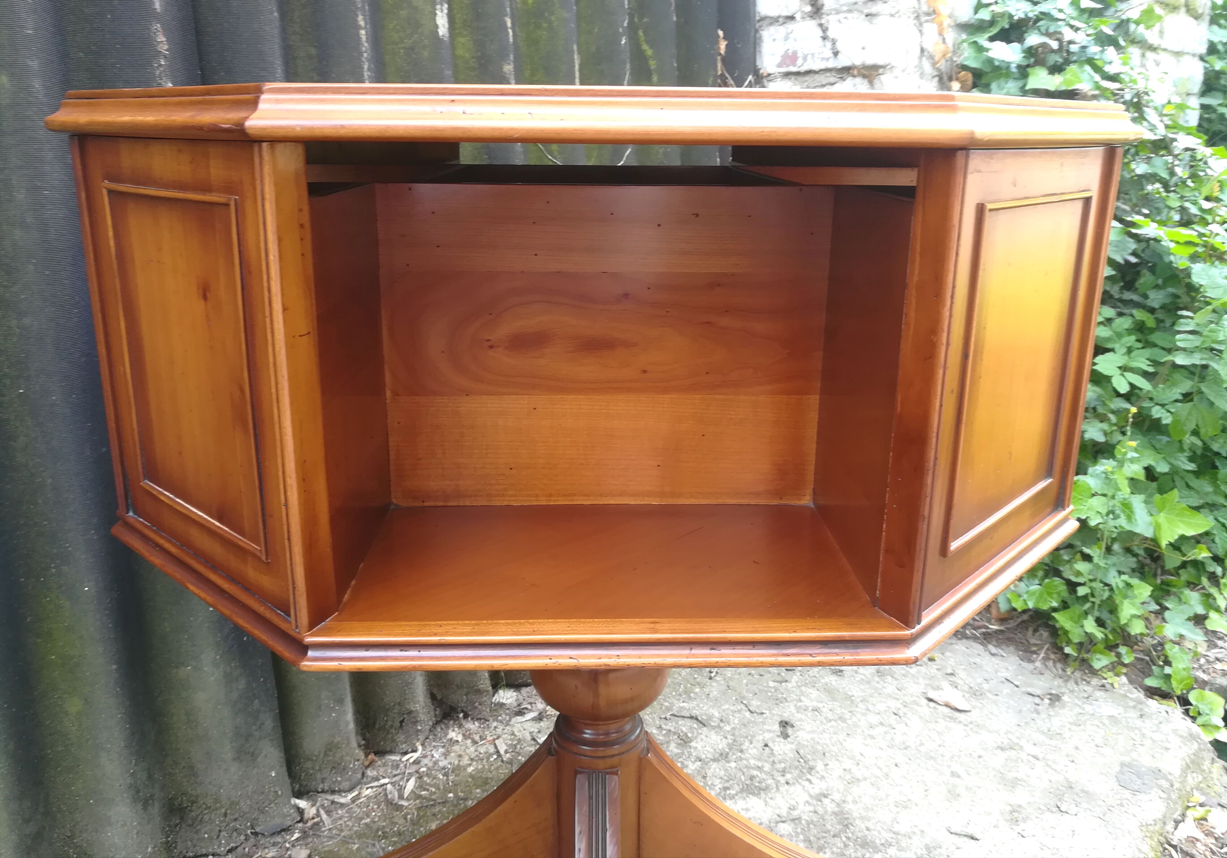 Storage cabinet revolving in cherry