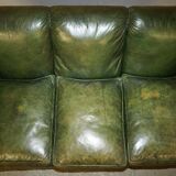 Victorian leather canapé, shield armrests, stamped Maple & Co.